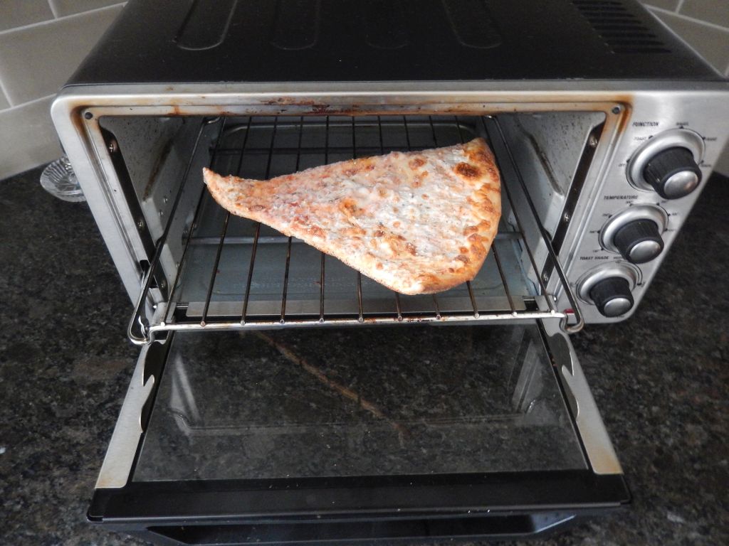 how to oven heat a catering party pizza slice.